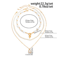 Thumbnail for Newly Layered Gold Tone Heart Pendant Pearl Chain Necklace Set