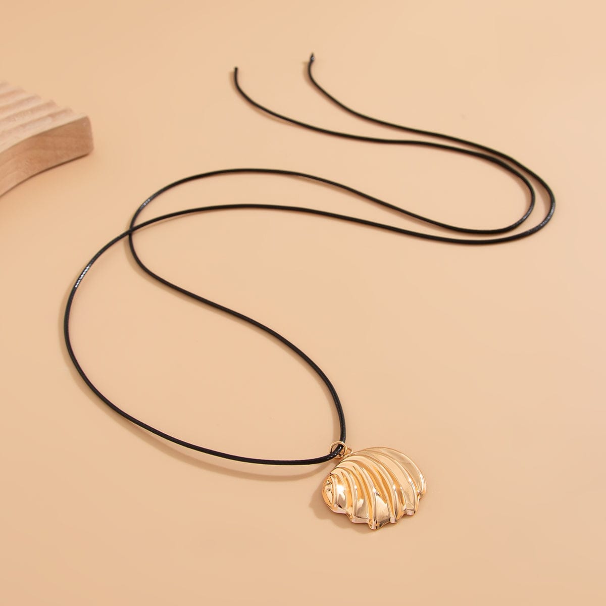 Abstract Metallic Shell Pendant Wax Cord String Necklace