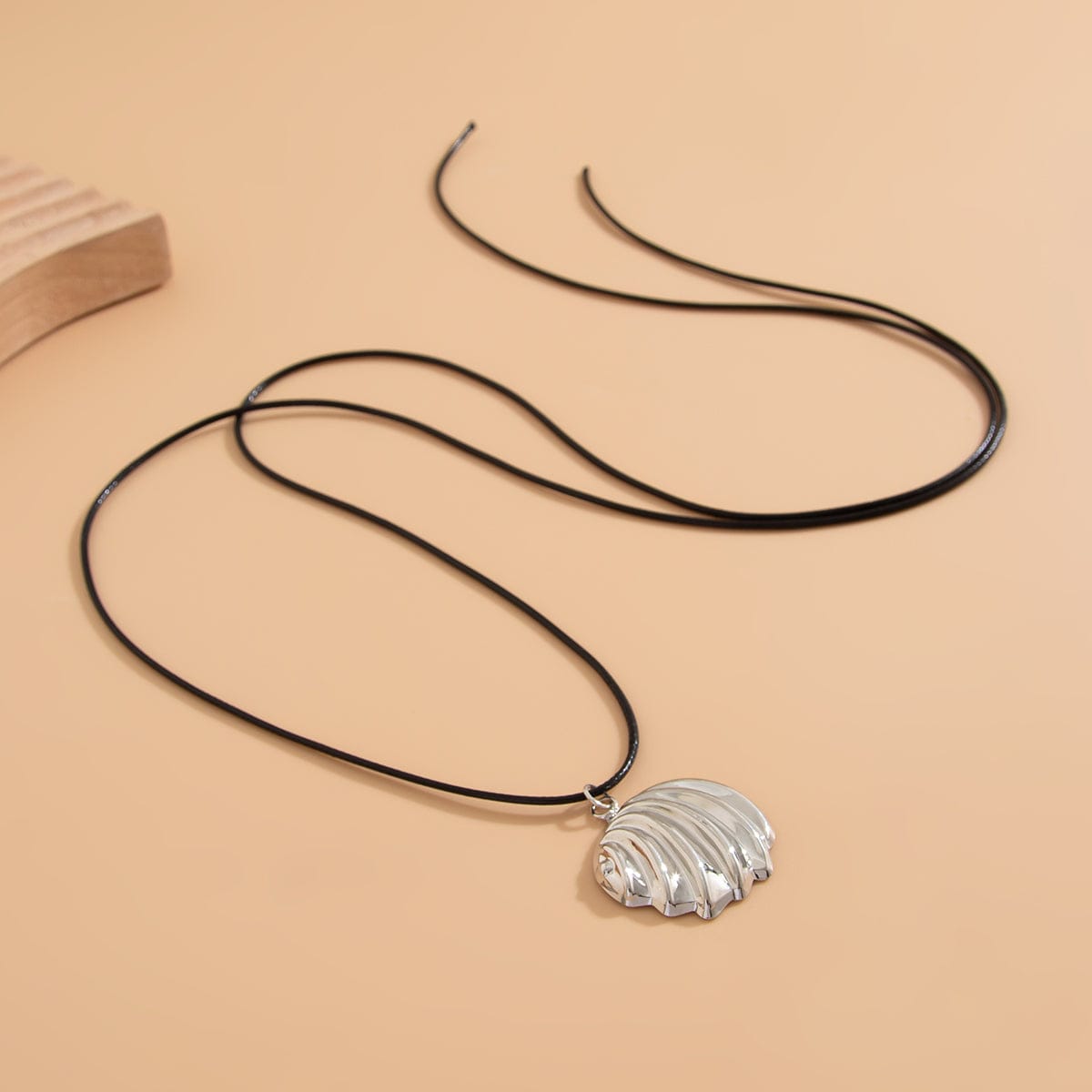 Abstract Metallic Shell Pendant Wax Cord String Necklace