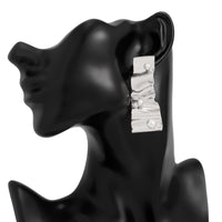 Thumbnail for Abstract Pleated Ribbon Pearl Stud Earrings - ArtGalleryZen