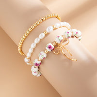 Thumbnail for Baroque 3pcs Bowknot Pendant Pearl Floral Acrylic Beaded Bracelet Set - ArtGalleryZen