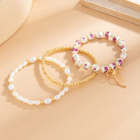 Thumbnail for Baroque 3pcs Bowknot Pendant Pearl Floral Acrylic Beaded Bracelet Set - ArtGalleryZen