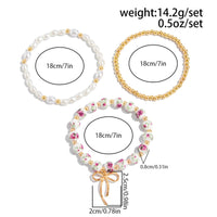 Thumbnail for Baroque 3pcs Bowknot Pendant Pearl Floral Acrylic Beaded Bracelet Set - ArtGalleryZen
