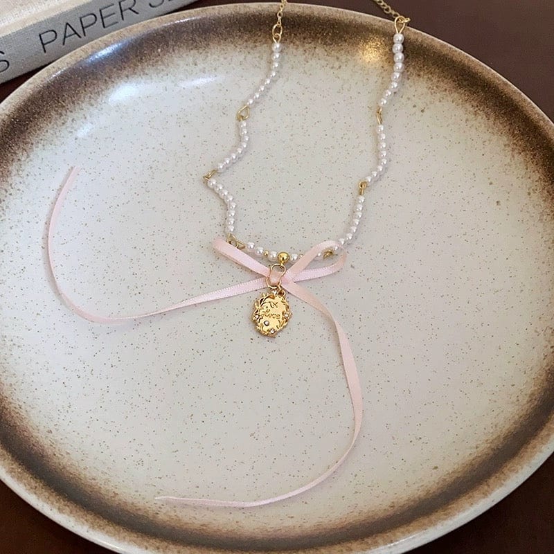 Baroque Pink Ribbon Bowknot Relief Pendant Pearl Necklace