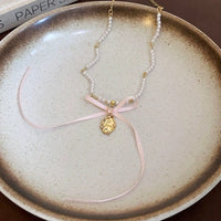 Thumbnail for Baroque Pink Ribbon Bowknot Relief Pendant Pearl Necklace