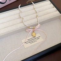 Thumbnail for Baroque Pink Ribbon Bowknot Relief Pendant Pearl Necklace