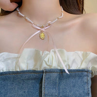 Thumbnail for Baroque Pink Ribbon Bowknot Relief Pendant Pearl Necklace