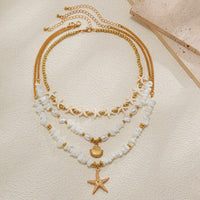 Thumbnail for Beach Style Layered Shell Starfish Pendant Turquoise Stone Chain Necklace Set - ArtGalleryZen