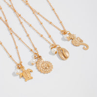 Thumbnail for Bohemia 4pcs Conch Turtle Seahorse Pearl Tassel Saturn Chain Necklace Set - ArtGalleryZen