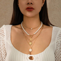 Thumbnail for Boho 4Pcs Crystal Inlaid Starfish Conch Pendant Pearl Chain Necklace Set - ArtGalleryZen