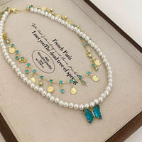 Thumbnail for Boho Layered Butterfly Rhinestone Shell Tassel Pearl Chain Necklace - ArtGalleryZen