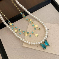 Thumbnail for Boho Layered Butterfly Rhinestone Shell Tassel Pearl Chain Necklace - ArtGalleryZen