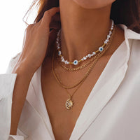 Thumbnail for Boho Layered CZ Inlaid Sun Moon Pendant Evil Eye Pearl Chain Necklace Set - ArtGalleryZen