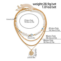 Thumbnail for Boho Layered CZ Inlaid Sun Moon Pendant Evil Eye Pearl Chain Necklace Set - ArtGalleryZen