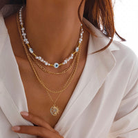 Thumbnail for Boho Layered CZ Inlaid Sun Moon Pendant Evil Eye Pearl Chain Necklace Set - ArtGalleryZen