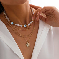 Thumbnail for Boho Layered CZ Inlaid Sun Moon Pendant Evil Eye Pearl Chain Necklace Set