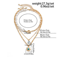 Thumbnail for Boho Layered Evil Eye Turquoise Sun Pendant Paperclip Pearl Chain Necklace Set - ArtGalleryZen