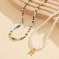 Thumbnail for Boho Layered Seed Bead Starfish Pendant Pearl Chain Necklace Set - ArtGalleryZen