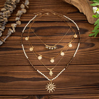 Thumbnail for Boho Layered Sun Hamsa Textured Round Disk Pendant Seed Beaded Necklace Set - ArtGalleryZen