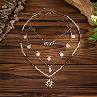 Thumbnail for Boho Layered Sun Hamsa Textured Round Disk Pendant Seed Beaded Necklace Set - ArtGalleryZen