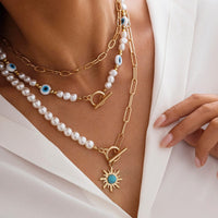 Thumbnail for Boho Layered Toggle Clasp Turquoise Sun Pendant Evil Eye Pearl Chain Necklace Set - ArtGalleryZen