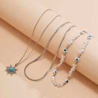 Thumbnail for Boho Turquoise Sun Pendant Evil Eye Pearl Chain Necklace Set - ArtGalleryZen