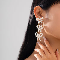 Thumbnail for Charming Pearl Beaded Bowknot Dangle Earrings - ArtGalleryZen