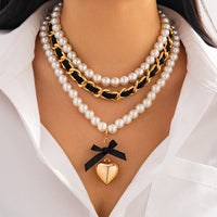 Thumbnail for Chic 3pcs Ribbon Heart Pendant Pearl Chain Velvet Necklace Set - ArtGalleryZen