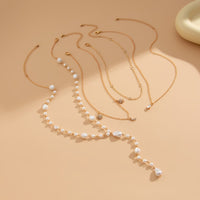 Thumbnail for Chic Crystal Inlaid Sun Moon Pendant Irregular Pearl Chain Y Necklace Set