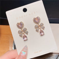 Thumbnail for Chic CZ Inlaid Crystal Ribbon Heart Dangle Earrings - ArtGalleryZen