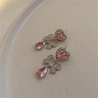 Thumbnail for Chic CZ Inlaid Crystal Ribbon Heart Dangle Earrings - ArtGalleryZen