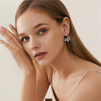 Thumbnail for Chic CZ Inlaid Moon Star Angel Dangle Earrings - ArtGalleryZen