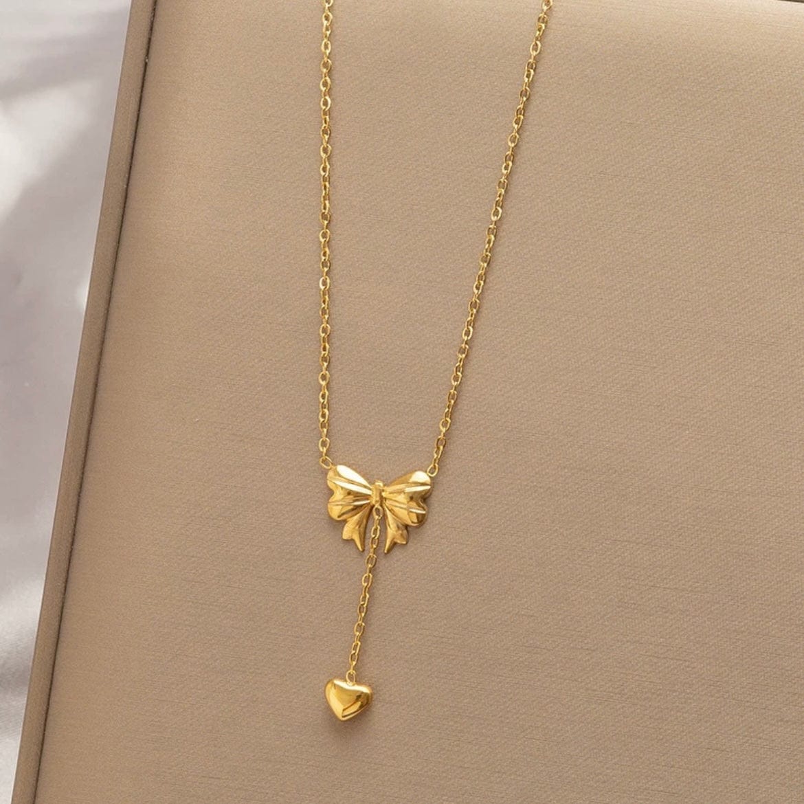 Chic Gold Plated Bowknot Heart Pendant Y Necklace - ArtGalleryZen
