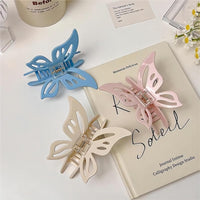 Thumbnail for Chic Hollowed-out Butterfly Chignon Claw Clip Hair Clip - ArtGalleryZen