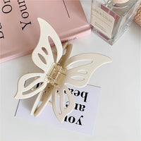 Thumbnail for Chic Hollowed-out Butterfly Chignon Claw Clip Hair Clip - ArtGalleryZen