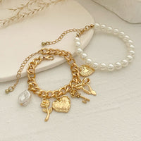 Thumbnail for Chic Layered Heart Bow Rose Charm Pearl Chain Bracelet Set - ArtGalleryZen