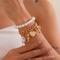 Thumbnail for Chic Layered Heart Bow Rose Charm Pearl Chain Bracelet Set - ArtGalleryZen