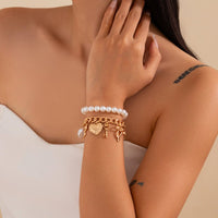 Thumbnail for Chic Layered Heart Bow Rose Charm Pearl Chain Bracelet Set - ArtGalleryZen