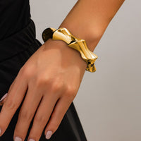 Thumbnail for Chic Silver Tone Glossy Twisted Bangle Bracelet - ArtGalleryZen