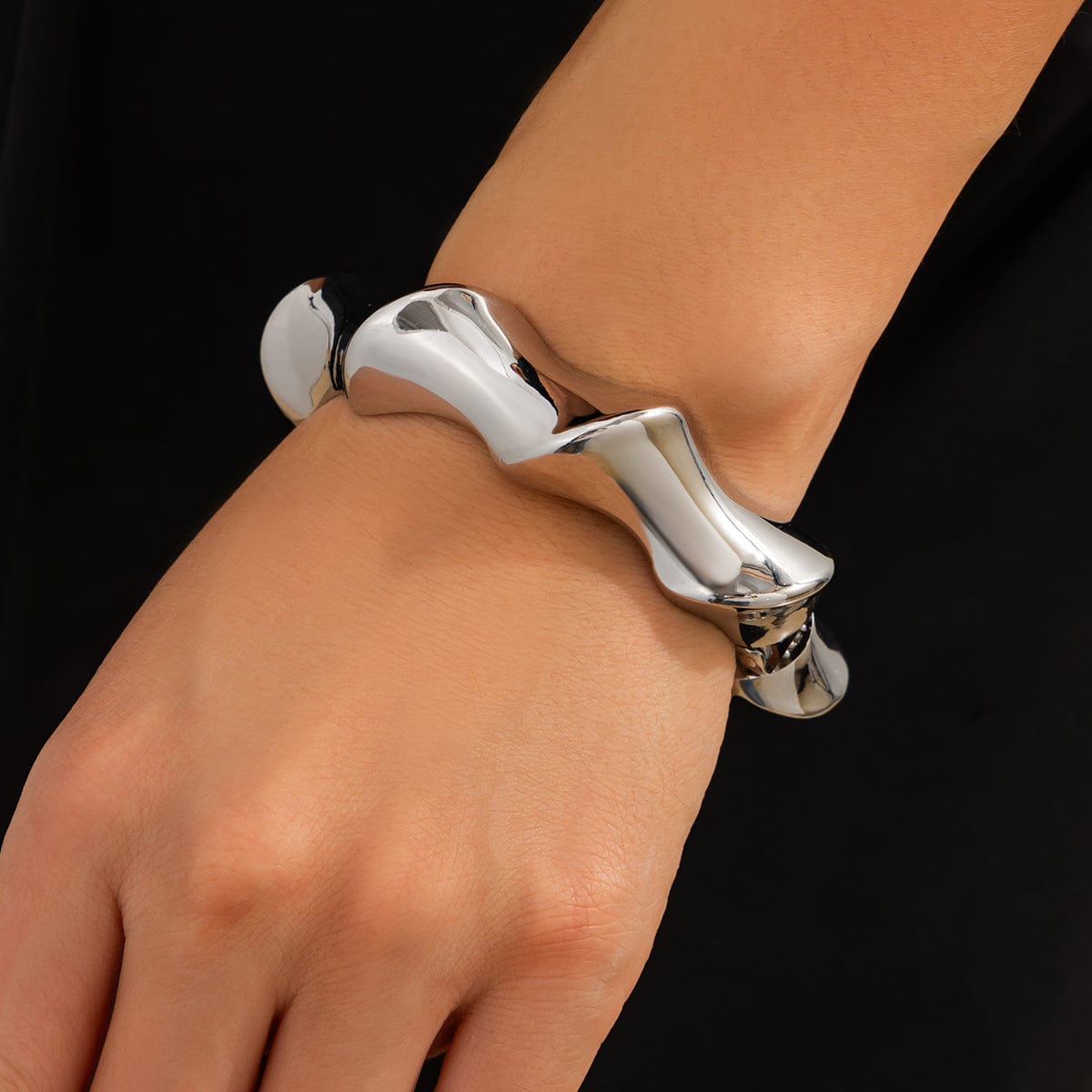 Chic Silver Tone Glossy Twisted Bangle Bracelet - ArtGalleryZen