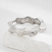 Thumbnail for Chic Silver Tone Glossy Twisted Bangle Bracelet