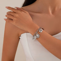 Thumbnail for Chic Silver Tone Pattern Heart Bowknot Pendant Bracelet - ArtGalleryZen