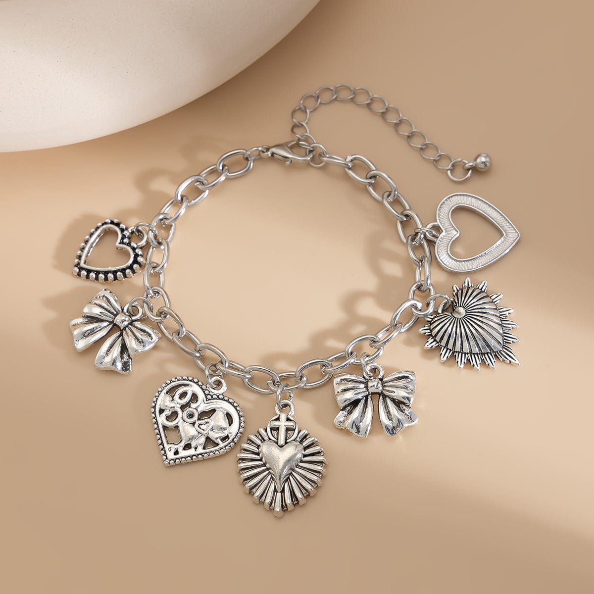 Chic Silver Tone Pattern Heart Bowknot Pendant Bracelet - ArtGalleryZen