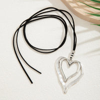 Thumbnail for Chic Velvet Double Hollow Heart Pendant Necklace - ArtGalleryZen