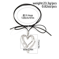 Thumbnail for Chic Velvet Double Hollow Heart Pendant Necklace - ArtGalleryZen