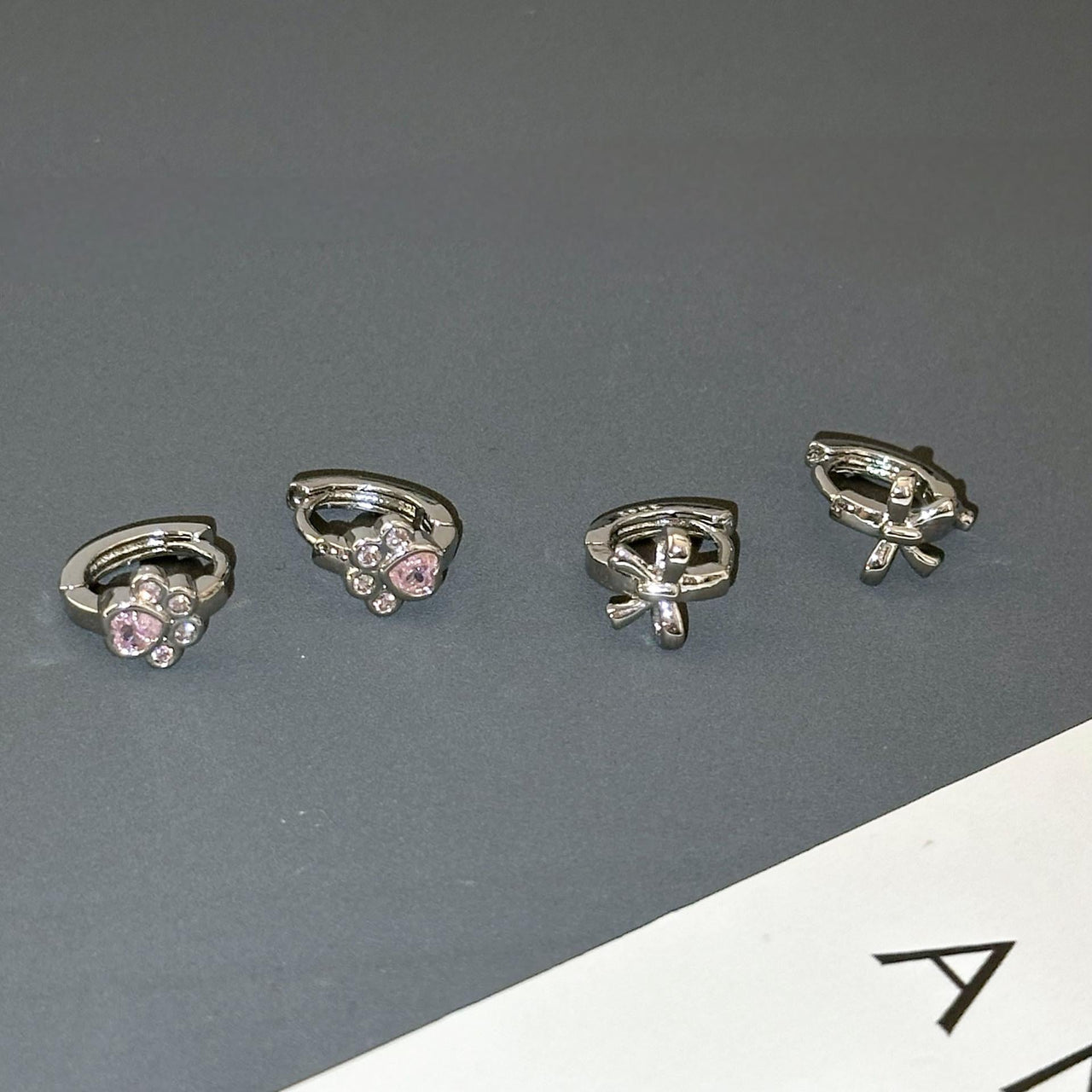 Dainty CZ Inlaid Cat Claw Bowknot Huggie Hoop Earrings - ArtGalleryZen