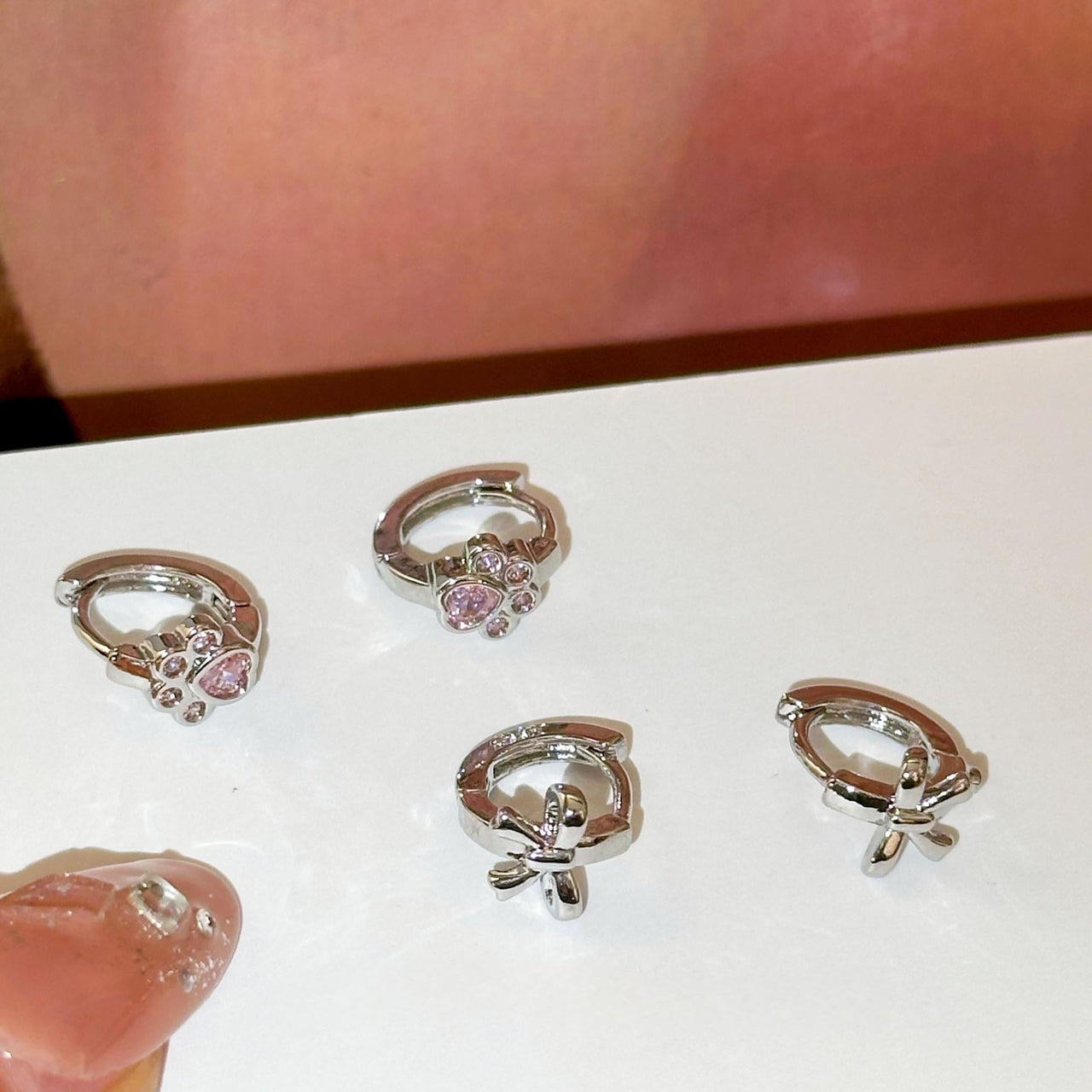 Dainty CZ Inlaid Cat Claw Bowknot Huggie Hoop Earrings - ArtGalleryZen