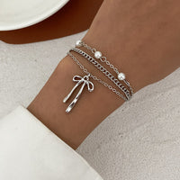Thumbnail for Dainty Layered Bowknot Pendant Pearl Curb Chain Bracelet - ArtGalleryZen