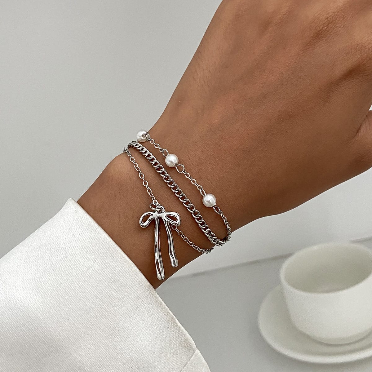Dainty Layered Bowknot Pendant Pearl Curb Chain Bracelet - ArtGalleryZen
