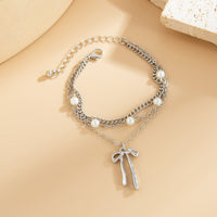 Thumbnail for Dainty Layered Bowknot Pendant Pearl Curb Chain Bracelet - ArtGalleryZen